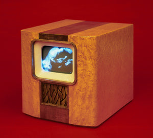 Miniature hand carved vintage television set used as part of Water Torture, artwork by James Leonard, 2000