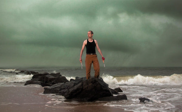 James Leonard - A Kiss for Luck, in front of ocean storm. Photo credit Michael Duva.