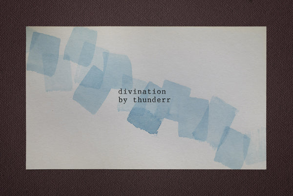 James Leonard - the words, divination by thunder, is hand typed at the center of a white index card; staccato brushstrokes in blue run diagonal across the painting  