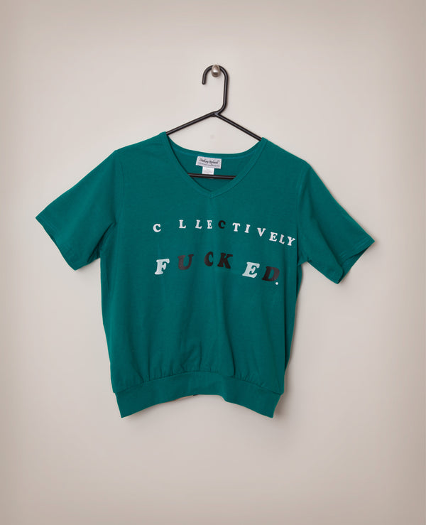 James Leonard - Green shirt that reads: Collectively fucked