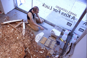 James Leonard sharpening knives for A Kiss For Luck performance artwork 2013. Photo credit Jeff Geiringer.