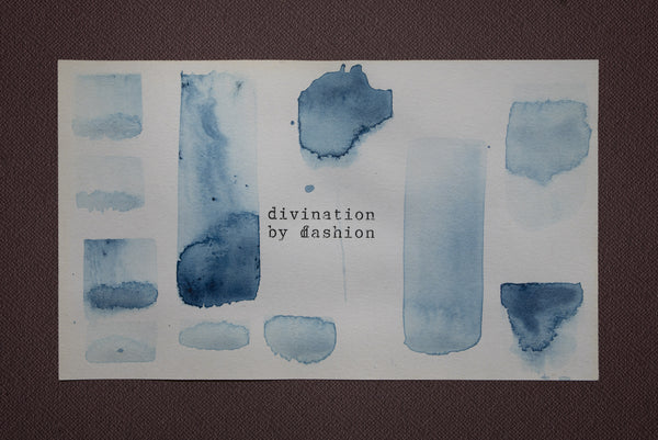James Leonard - watercolor painting ready to be framed which states, divination by fashion