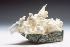 James Leonard - Detail shot of Delaware soap carving, placed inside an origami boat made from printed U.S. currency 