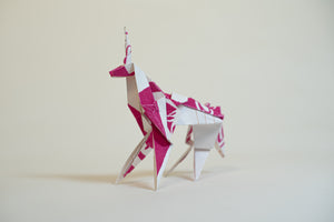 James Leonard - An origami unicorn set in front of a white background