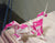 James Leonard - Detail of unicorn origami folds and flocked pink poster paper, Hungry Dust