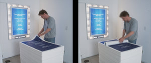 James Leonard - A pair of photos depicting a man picking up a blue movie poster from the installation, I Dream of Publicity, to take home