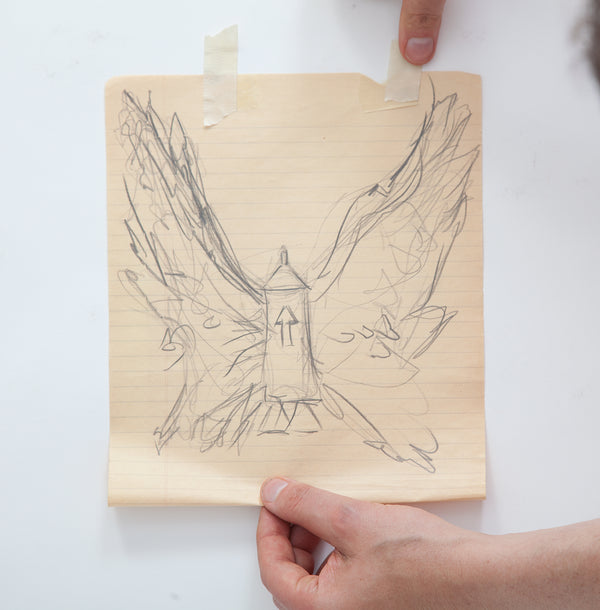 James Leonard - First Last Rocket sketch depicting an aerosol spray paint canister with wings, atop lined paper