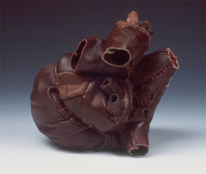 James Leonard - Detail of a heart from Lunar Phases, made with oxblood leather 