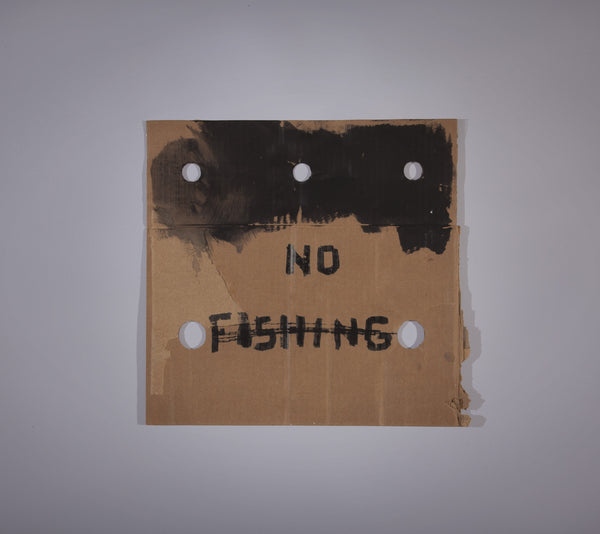 James Leonard - The black painting on cardboard in No Fishing Sign no. 123 has five, perfectly circular, holes punched through its surface