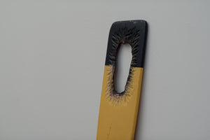 James Leonard - Detail paddle image of Untitled Oar no. 3; carved markings are pronounced