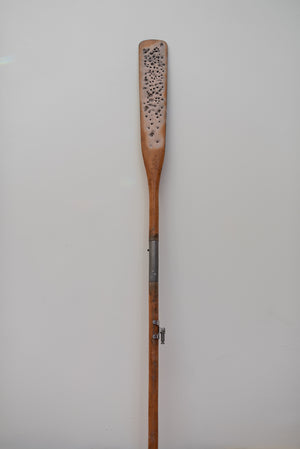 James Leonard - Full image of Untitled Oar no. 6, showcasing tiny insect-like holes in the paddle and metal hardware on the stem