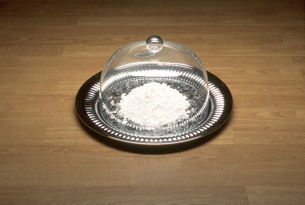 James Leonard - image of Scent, in which soap shavings are served on a silver platter that is placed on the ground