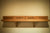 James Leonard - Detail photo of the upper shelf of Altarpiece to Interactivity, with wood text blocks arranged to say science makes myth reality