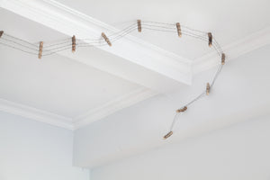 James Leonard - A closer image of Running Fence no. 6 as it rolls across a soffit and touches the far wall