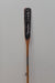 James Leonard - Full frame image of Untitled Oar no. 5, displaying a lean, burnt paddle and metal hardware towards the base of the stem