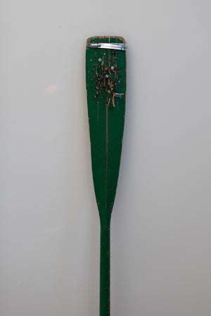 James Leonard - Front facing image of the paddle of Untitled Oar no. 9, whose surface has been nailed through a hundred times