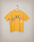 James Leonard - Yellow shirt that reads: Multiply